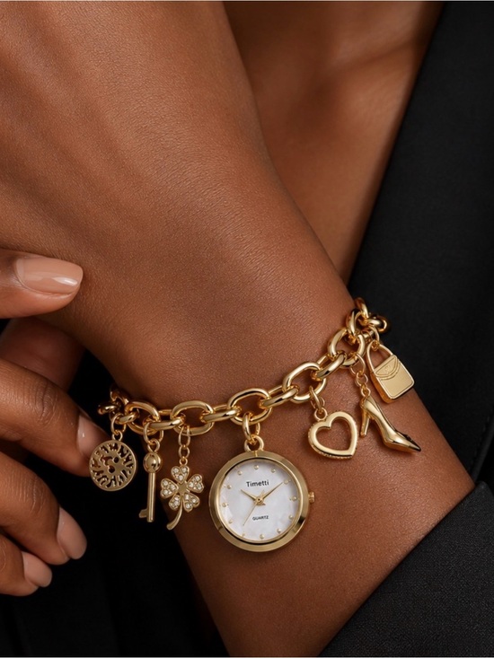 Anthropologie Accessories - Gold Multiple Charm Bracelet Watch